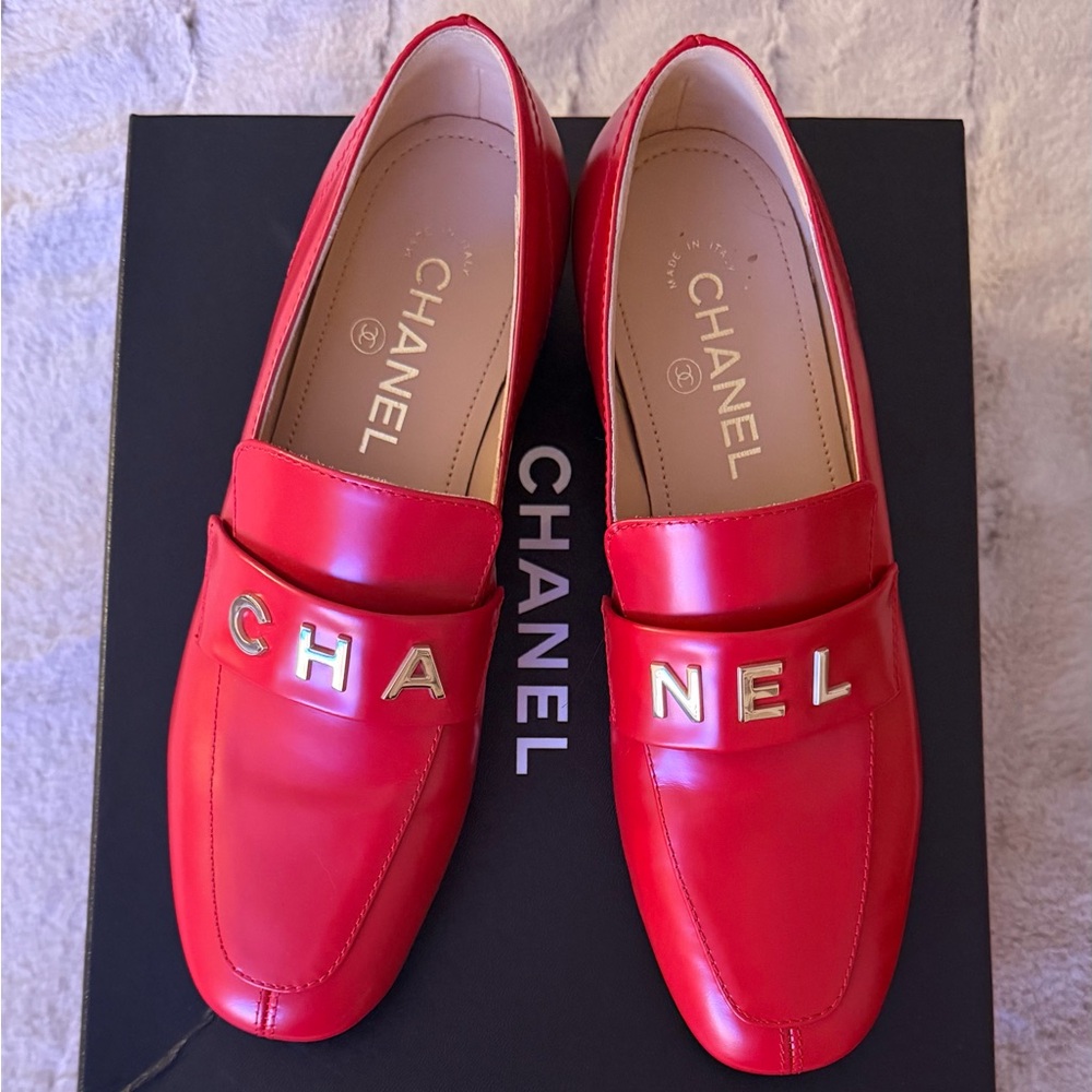 CHANEL Red Leather Loafers with Gold CHA NEL Letters